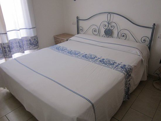 Hotel Del Porto Cannigione Bagian luar foto