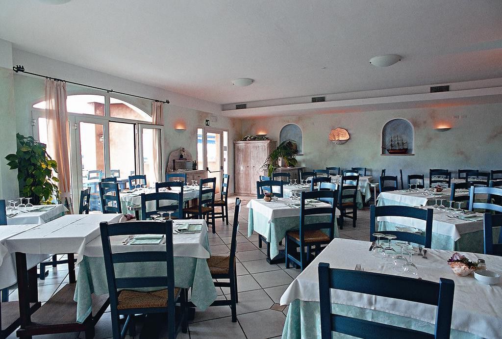 Hotel Del Porto Cannigione Bagian luar foto